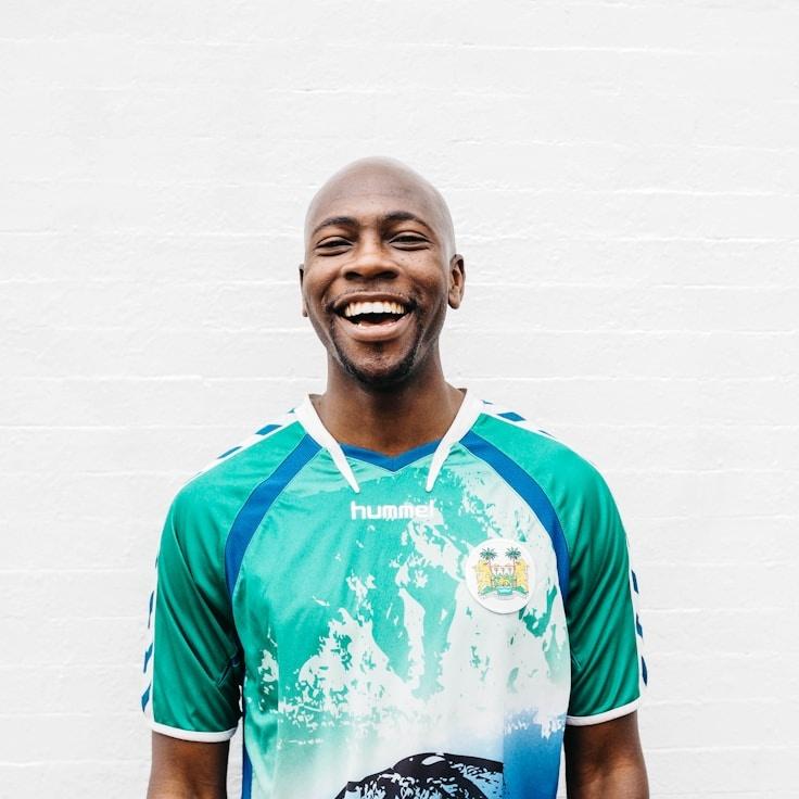 Kaveri Mehta, Lead Design Curator at MeadowBeaconHub, reviewing corporate floral arrangements